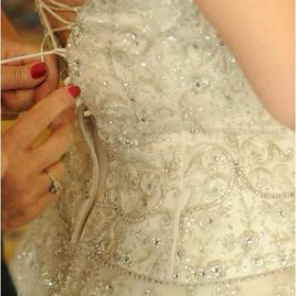 Kenneth Poole wedding dress.   Size 8 appropriate.  Lace up back.  Elegant. - Picture 8 of 11